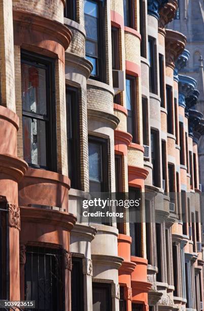 windows on brownstone buildings - historic building stock pictures, royalty-free photos & images