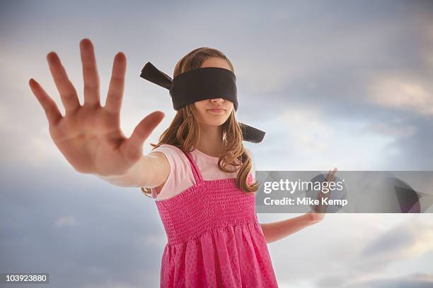 blindfolded teenage girl - blind fold stock pictures, royalty-free photos & images