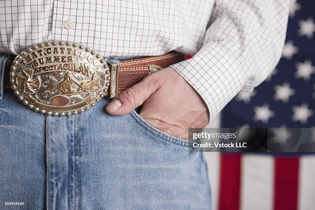 Man's hand in the pocket of his jeans