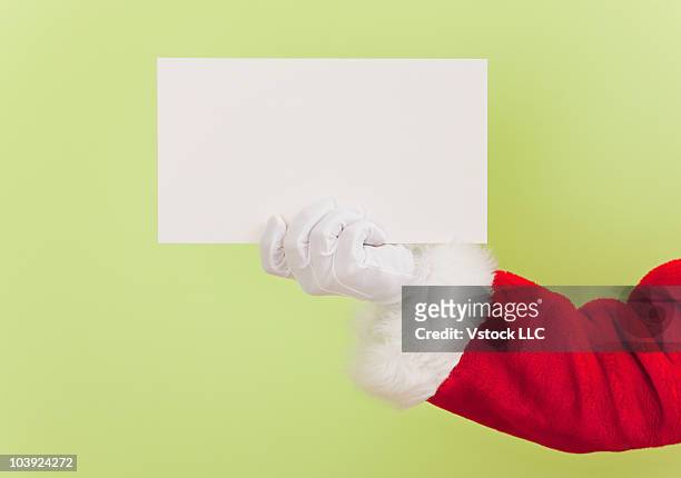 santa claus holding a blank sign - hand studio shot stock pictures, royalty-free photos & images