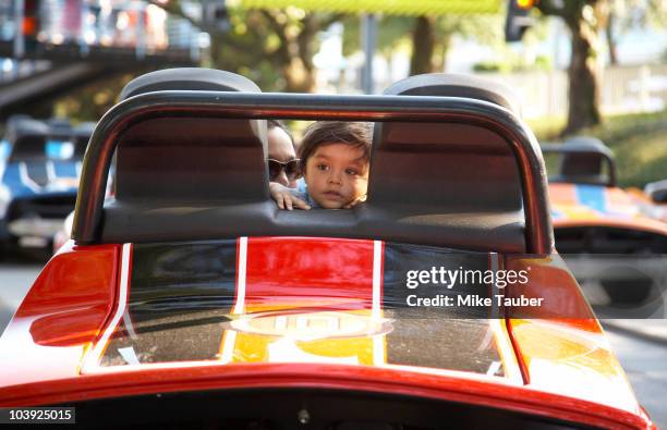 child and parent in bumper car - orlando florida family stock pictures, royalty-free photos & images