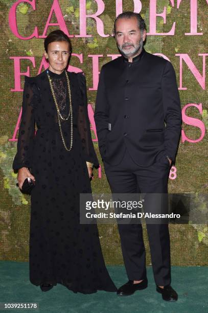 Remo Ruffini and a guest attend the Green Carpet Fashion Awards at Teatro Alla Scala on September 23, 2018 in Milan, Italy.