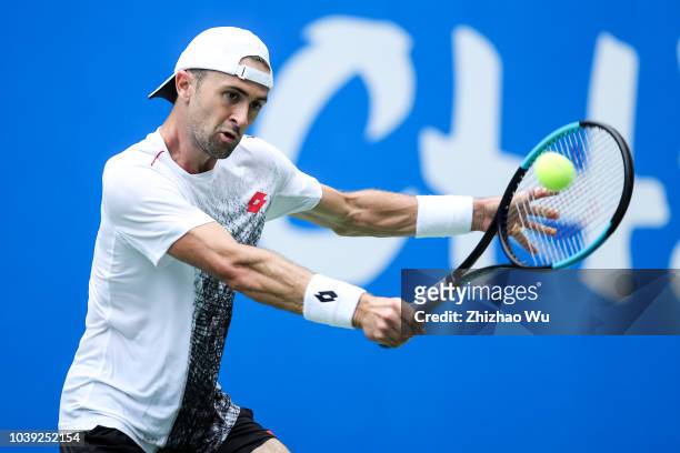 Tim Smyczek of United States in action against Joao Sousa of Portugal during ATP World Tour Chengdu Open 1st Round at Sichuan International Tennis...