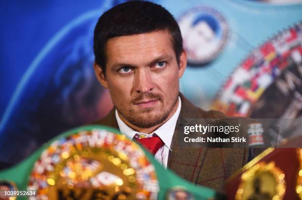 Oleksandr Usyk looks on as he speaks to the media during the Oleksandr Usyk and Tony Bellew press conference at the Radisson Blu Edwardian Hotel on...