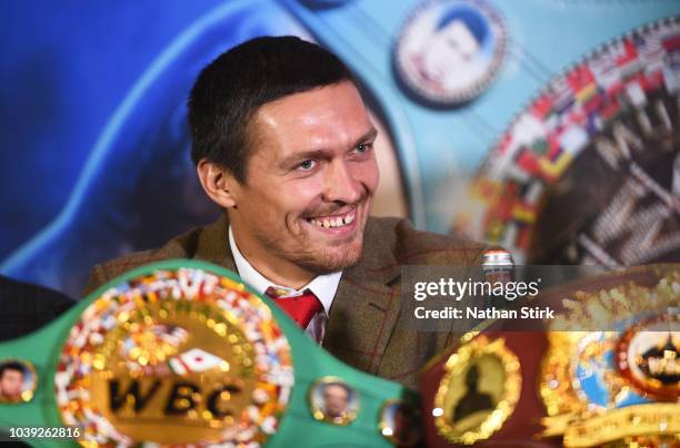 Oleksandr Usyk speaks to the media during the Oleksandr Usyk and Tony Bellew press conference at the Radisson Blu Edwardian Hotel on September 24,...