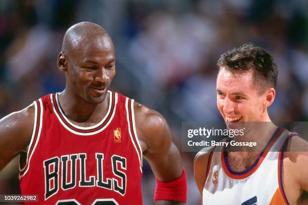 Michael Jordan of the Chicago Bulls is seen talking to Steve Nash of Phoenix Suns during the game between the Chicago Bulls and the Phoenix Suns on...