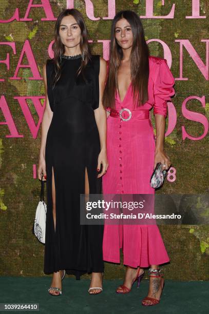 Giorgia Tordini and Gilda Ambrosio attend the Green Carpet Fashion Awards at Teatro Alla Scala on September 23, 2018 in Milan, Italy.