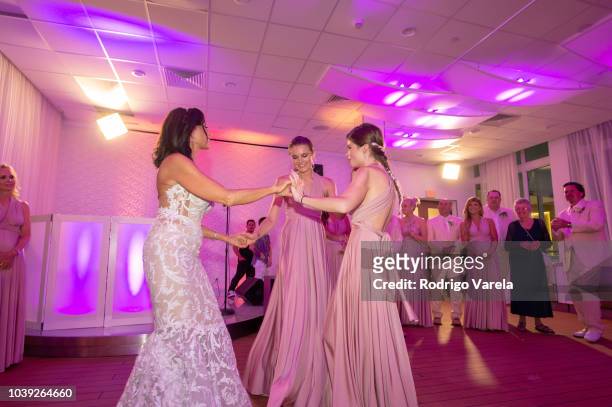 Danielle Staub dancing with daughters Christine and Jillian on May 5, 2018 in Bimini, Bahamas.