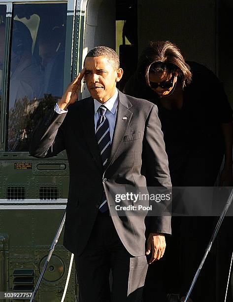 President Barack Obama and First Lady Michelle Obama arrive at the White House September 8, 2010 in Washington, DC. The President was traveling to...