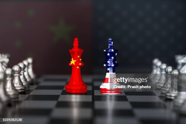 usa and china trade relations, cooperation strategy. us america and china flags on chess king on a chessboard. - china stock-fotos und bilder