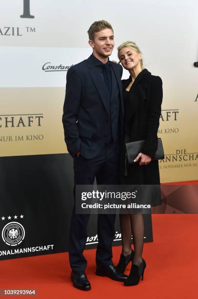 Christoph Kramer and his girlfriend Celina arrive for the world premiere of the film 'Die Mannschaft' at the Cinestar movie theater at Sony...