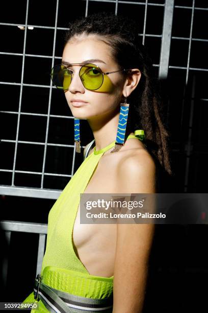 Model is seen backstage ahead of the Emporio Armani show during Milan Fashion Week Spring/Summer 2019 on September 20, 2018 in Milan, Italy.