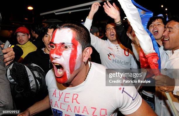 Supporters of Liga Desportiva Universitaria Quito celebrate victory over Estudiantes on the streets of Quito after a match as part of the Recopa 2010...