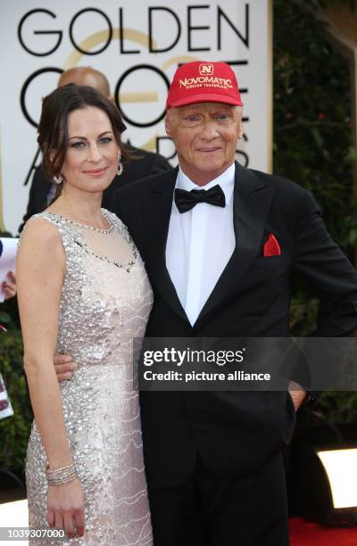 Niki Lauda and wife Birgit Wetzinger attend the 71st Annual Golden Globe Awards aka Golden Globes at Hotel Beverly Hilton in Los Angeles, USA, on 12...