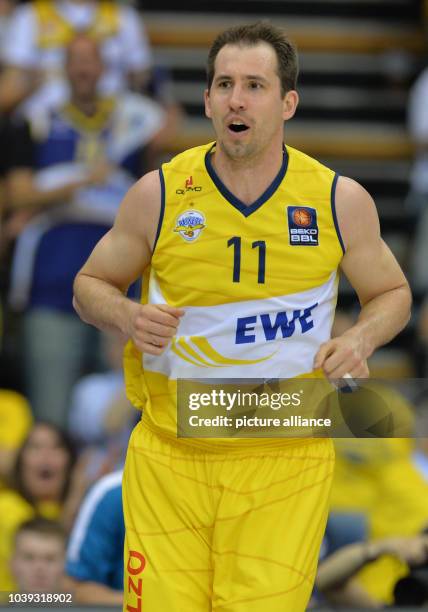 Oldenburg's Adam Chubb celebrates a basket during the Bundesliga men's basketball playoff semi-final, fourth match day match between EWE Baskets...