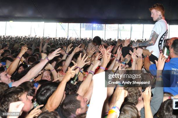 Frank Carter of Gallows performs in the crowd during the second day of Reading Festival 2010 on August 28, 2010 in Reading, England.