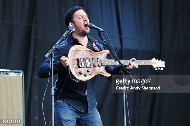 Isaac Brock of Modest Mouse performs on stage during the second day of Reading Festival 2010 on August 28, 2010 in Reading, England.