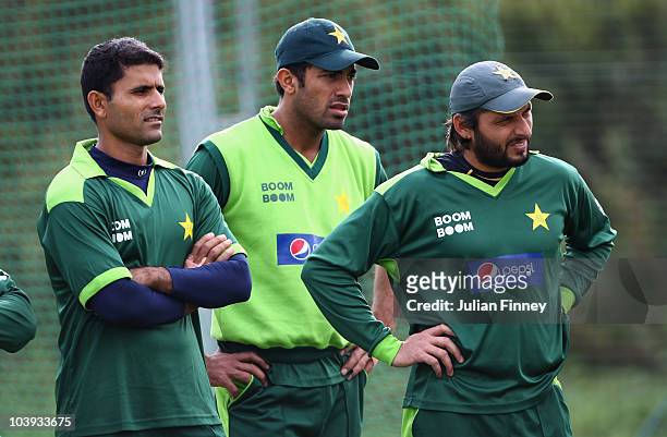 Shahid Afridi, Wahab Riaz and Abdul Razzaq of Pakistan look on during a Pakistan Training Session at The Riverside on September 9, 2010 in...