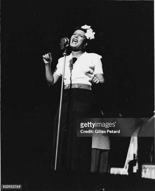 Billie Holiday performs on stage in 1950 in the United States.