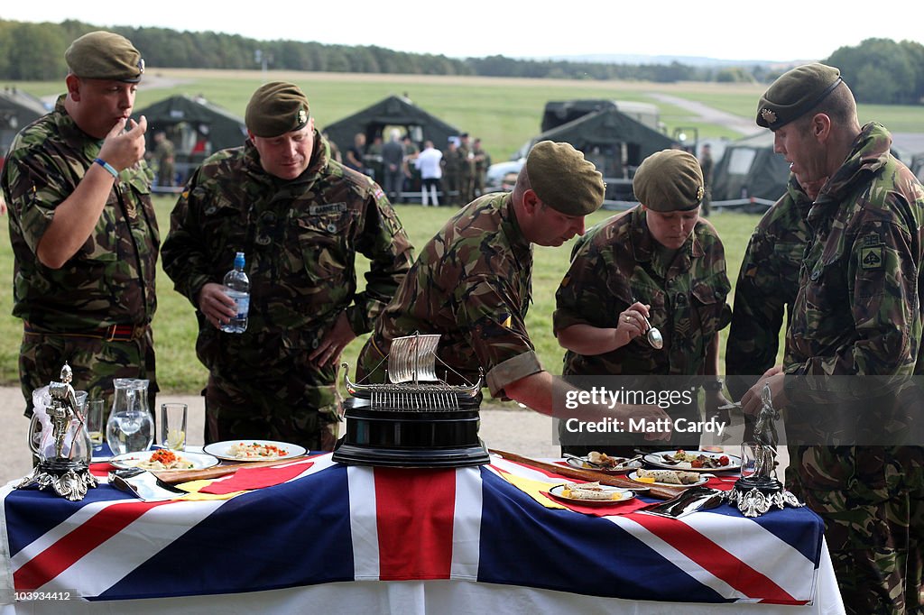 Combat Cooking Judges taste a meal presented by army military chefs which they have ...