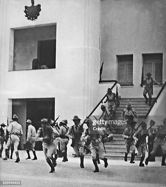 Members of Batista's army ready to go into action, after the attack on the Moncada garrison house by the group led by Fidel Castro, 26 July 1953.