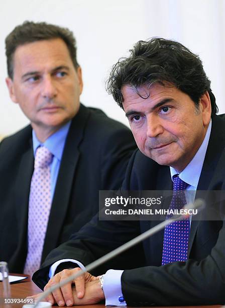 French Minister of Immigration Eric Besson and French State Secretary for European Affaires Pierre Lellouche look on at the beginning of official...