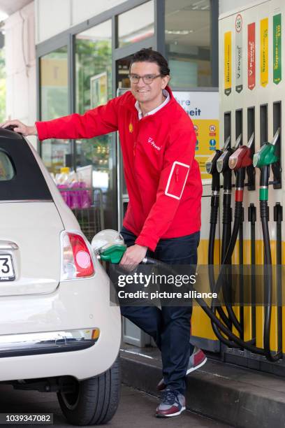 667 Gas Station Manager Stock Photos, High-Res Pictures, and Images ...