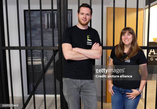 Philip Kirchhof and his girlfriend Caroline Murawski, owners of the 'Big Break' company, standing in their Room Escape game in Hamburg, Germany, 8...