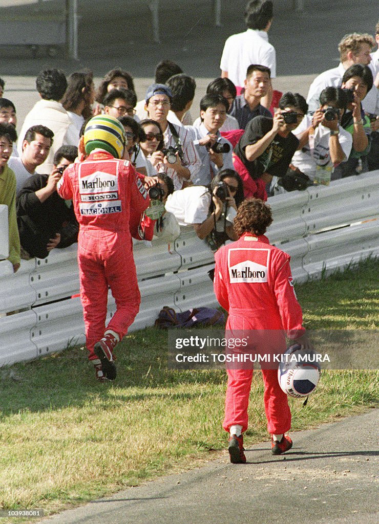 Ayrton Senna of Brazil (L) and Alain Pro