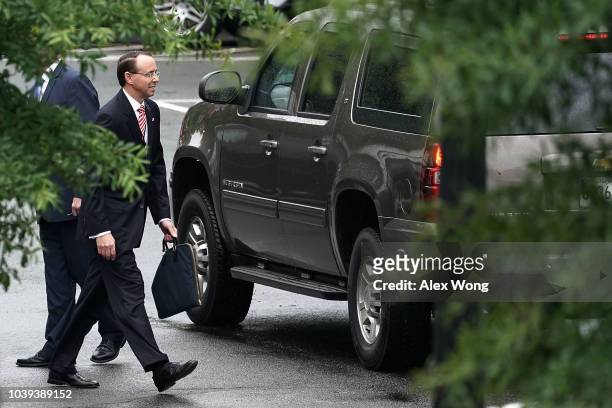 Deputy Attorney General Rod Rosenstein leaves after a meeting at the White House September 24, 2018 in Washington, DC. White House Press Secretary...