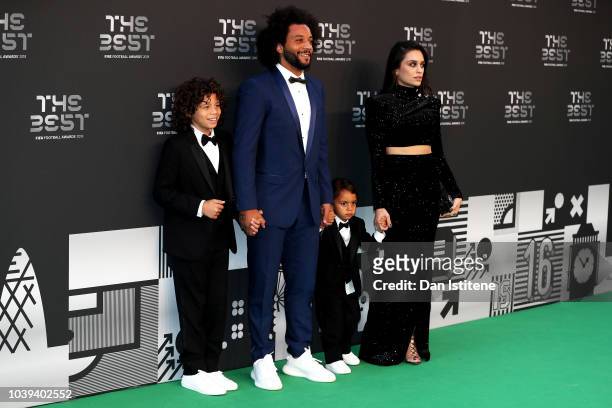 Marcelo of Real Madrid and wife Clarisse Alves arrive on the Green Carpet with their children Enzo and Liam ahead of The Best FIFA Football Awards at...