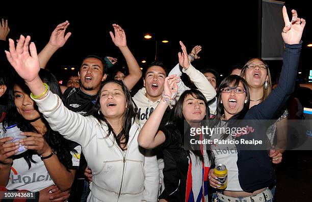 Supporters of Liga Desportiva Universitaria Quito celebrate victory over Estudiantes on the streets of Quito after a final match as part of the...
