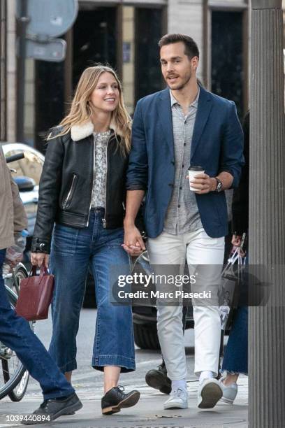 Actress Melissa Benoist and Chris Wood are seen strolling on Rue Royale on September 24, 2018 in Paris, France.