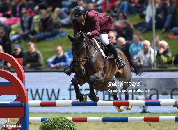 Qatar's Ali Yousef Al Rumaihi on Gunder during the Poresta Youngster-Cup in Hamburg, Germany, 31 May 2014. The German show jumping and dressage...