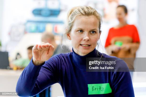 Former German swim olympic gold medalist Britta Steffen during the kids workshop 'Driven by Kids' hosted by Volkswagen AG at DRIVE Volkswagen Group...