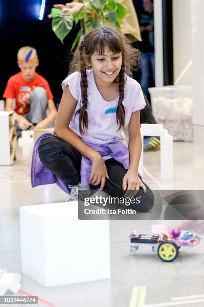 Arche kids during the kids workshop 'Driven by Kids' hosted by Volkswagen AG at DRIVE Volkswagen Group Forum on September 24, 2018 in Berlin, Germany.