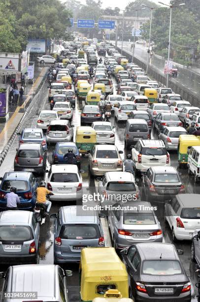 Traffic congestion seen at ITO following rains on September 24, 2018 in New Delhi, India. The continuous downpour throughout the day leads to a drop...