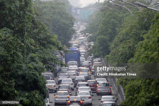 Traffic congestion seen at DND following heavy rains, on September 24, 2018 in Noida, India. The continuous downpour throughout the day leads to a...