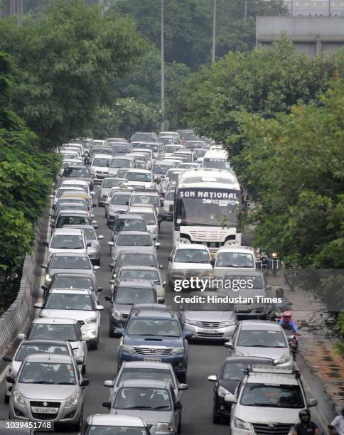 Traffic congestion seen at DND following heavy rains, on September 24, 2018 in Noida, India. The continuous downpour throughout the day leads to a...