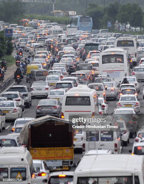 Traffic congestion seen at expressway road due to rain, on September 24, 2018 in Noida, India. The continuous downpour throughout the day leads to a...