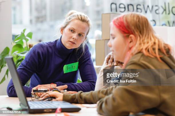 Former German swim olympic gold medalist Britta Steffen and Arche kids during the kids workshop 'Driven by Kids' hosted by Volkswagen AG at DRIVE...