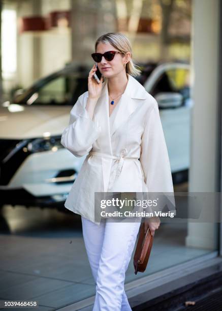 Guest is seen outside Marni during Milan Fashion Week Spring/Summer 2019 on September 23, 2018 in Milan, Italy.