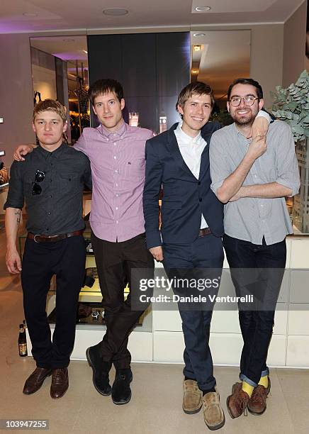 Dominic Sennet, Sam Fry, Micky Osment and Edward Ibbotson of the band Life In Film pose during the VOGUE Fashion's Night Out at the Burberry boutique...