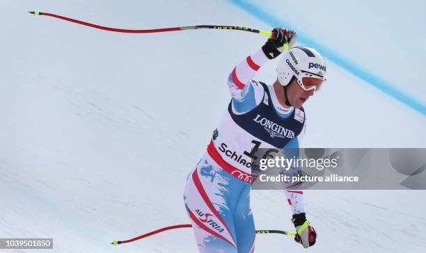 Romed Baumann of Austria reacts during the men's super combined-downhill at the Alpine Skiing World Championships in Schladming, Austria, 11 February...