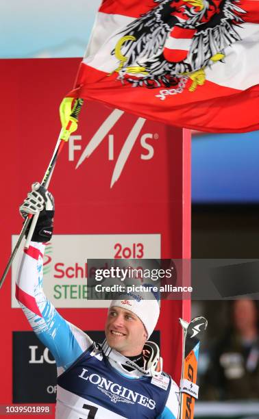 Romed Baumann of Austria reacts during the second run of the men's super combined-downhill at the Alpine Skiing World Championships in Schladming,...