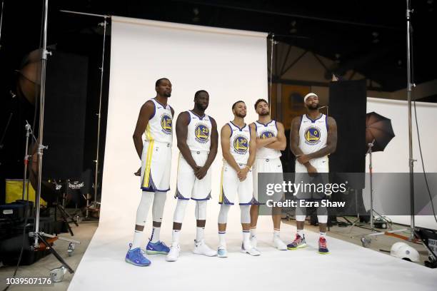 Kevin Durant, Draymond Green, Stephen Curry, Klay Thompson, and DeMarcus Cousins of the Golden State Warriors pose for a group picture during the...