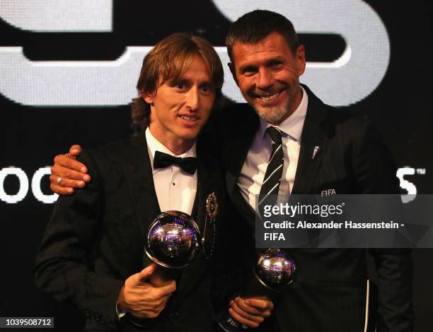 Luka Modric of Croatia and Real Madrid pose for a photo with Zvonimir Boban, FIFA Deputy Secretary General after The Best FIFA Football Awards at...