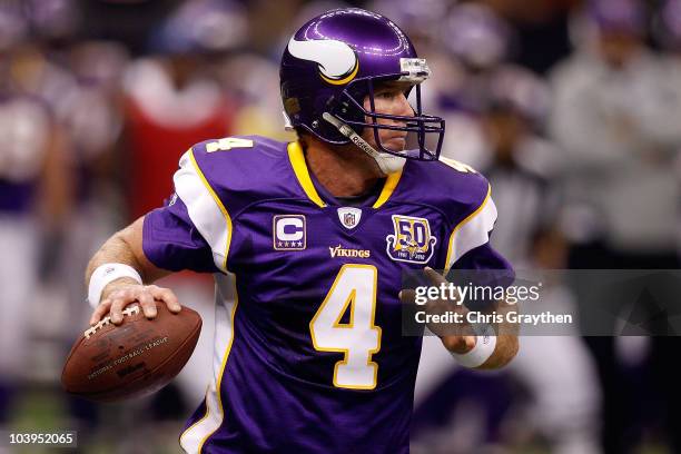 Quarterback Brett Favre of the Minnesota Vikings looks to pass the ball against the New Orleans Saints at Louisiana Superdome on September 9, 2010 in...