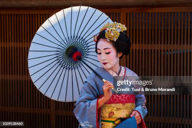 japan, kyoto, gion, maiko or apprentice geisha - japanese culture stock pictures, royalty-free photos & images