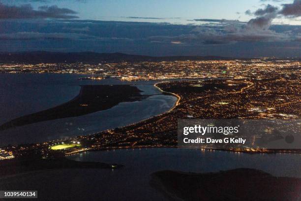 aerial view of dublin cityscape at twilight - dublin aerial stock pictures, royalty-free photos & images